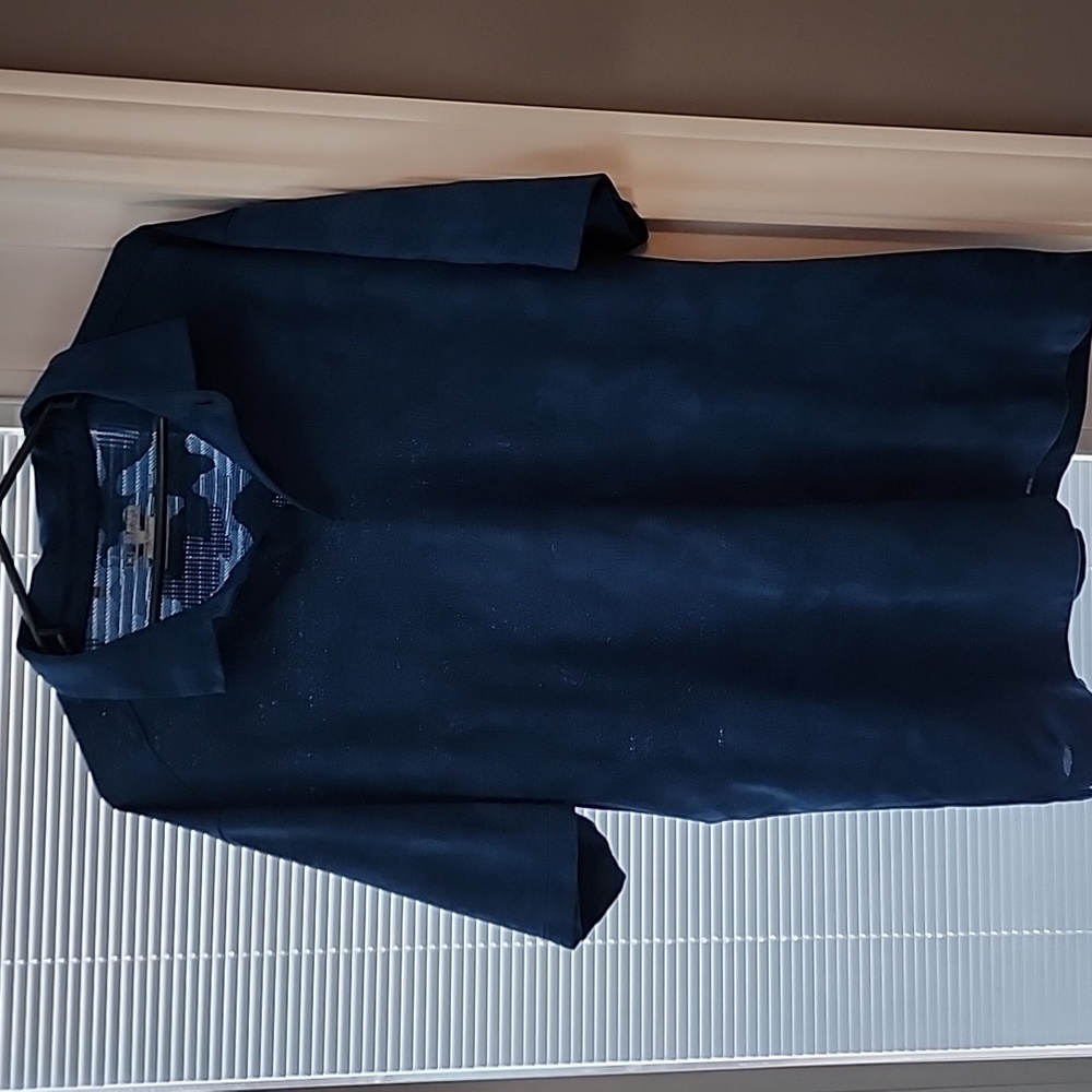 Mens Under Armour size 2XL polo shirt.  Blue in color.